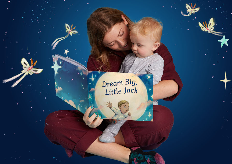 Mum and baby reading Dream Big Little One