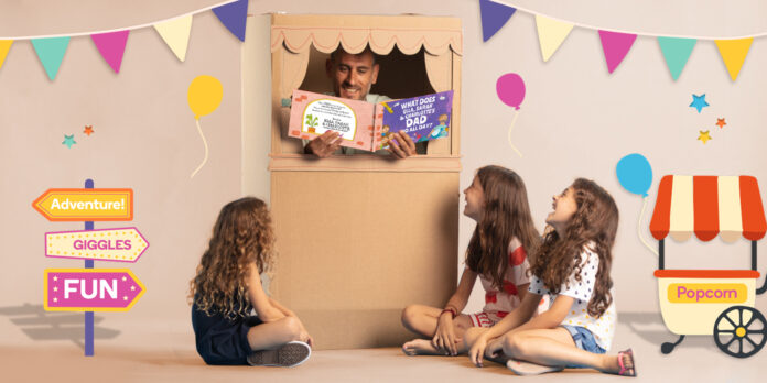 2022_Family_Reading_Blog_Header Dad reading a story book to his three daughters