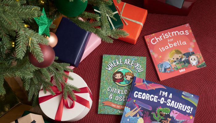 A Christmas tree with Wonderbly books underneath