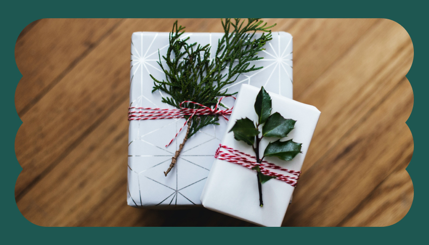 Book wrapped using twigs and rosemary as decoration