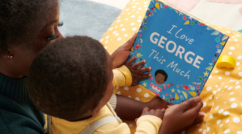 baby boy reads a book from wonderbly